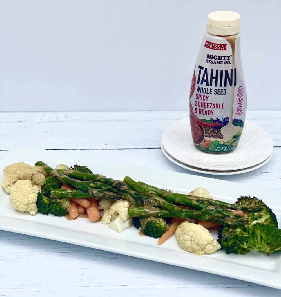 Mighty Sesame Harissa Tahini and roasted vegetables.