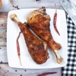 Overhead view of air fryer turkey leg.