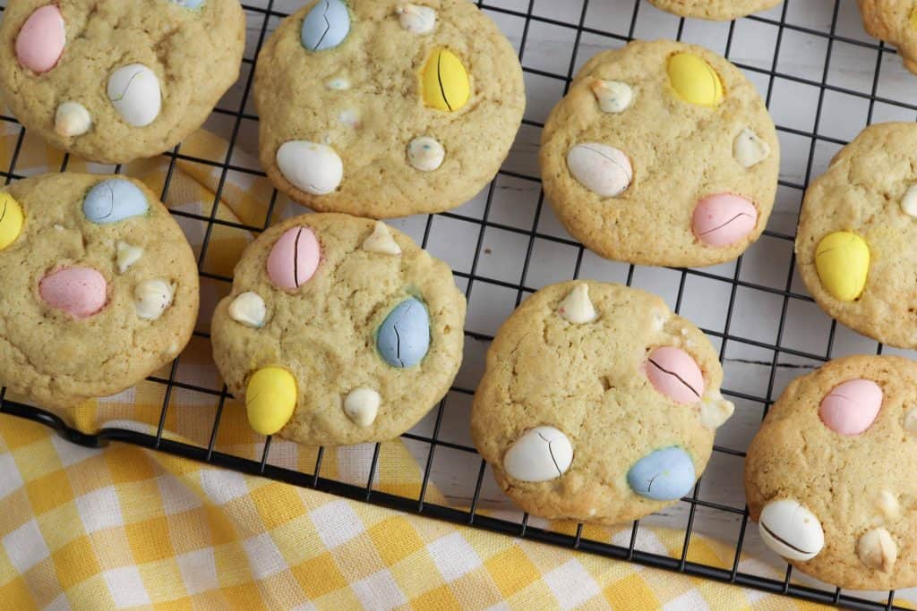 Overhead view of Cadbury Mini Eggs Cookies on a baking rack.