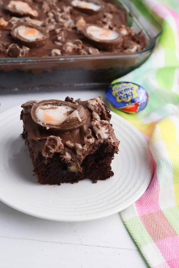 Slice of Cadbury Creme Egg Chocolate Poke Cake