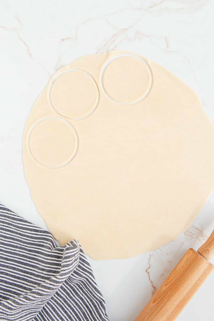 Circles cut out in pie dough.