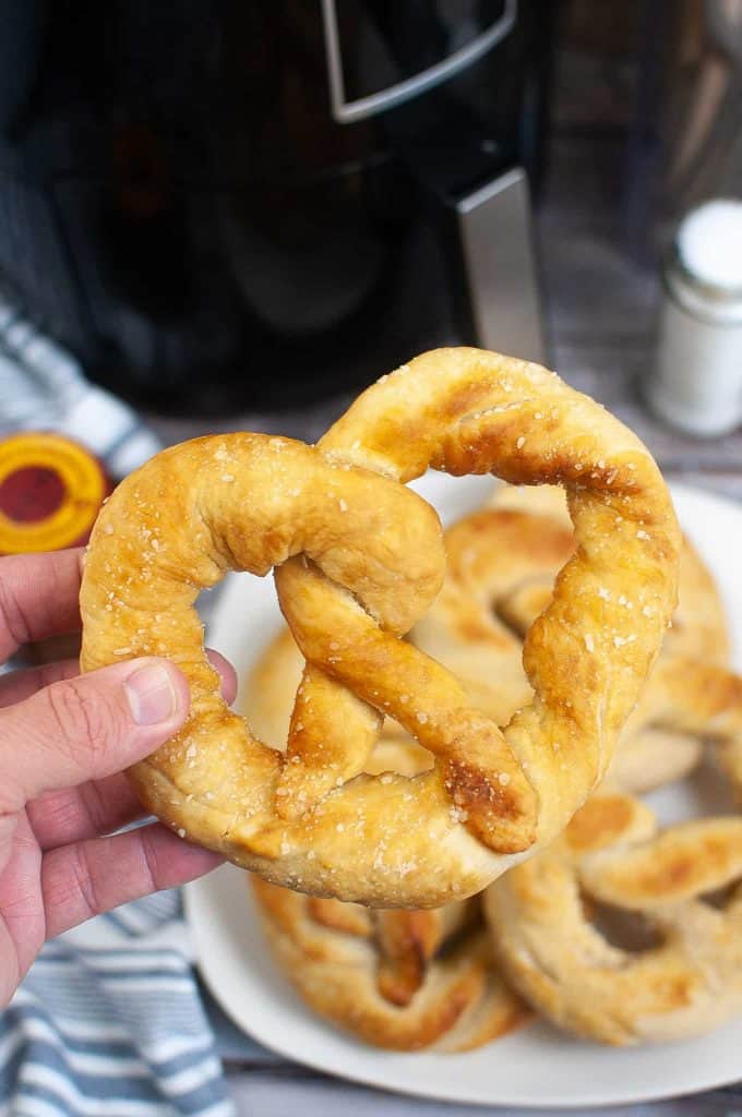Closeup of air fryer soft pretzel.