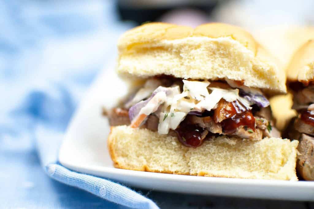 Closeup of barbecue pork sliders.