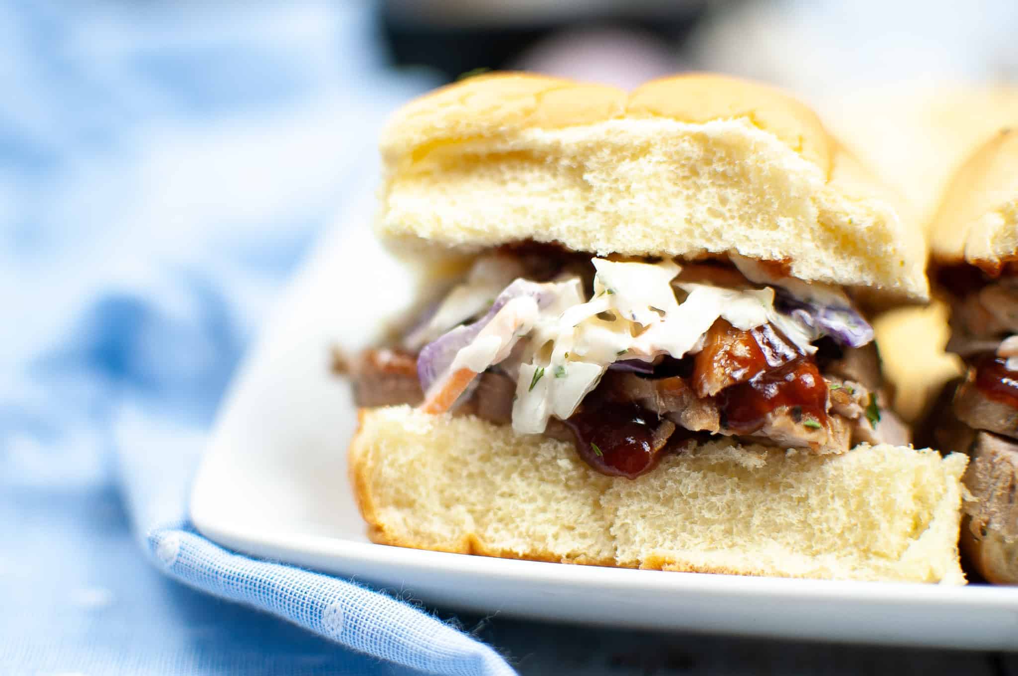 Closeup of barbecue pork sliders.