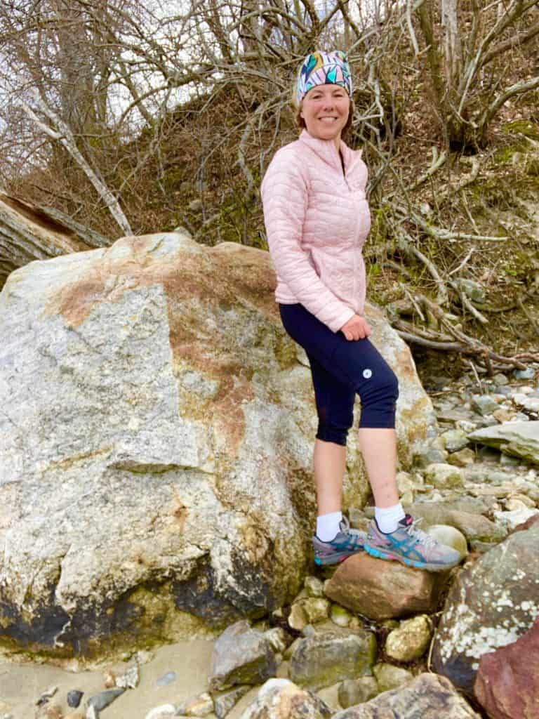 Hiking near large rock.
