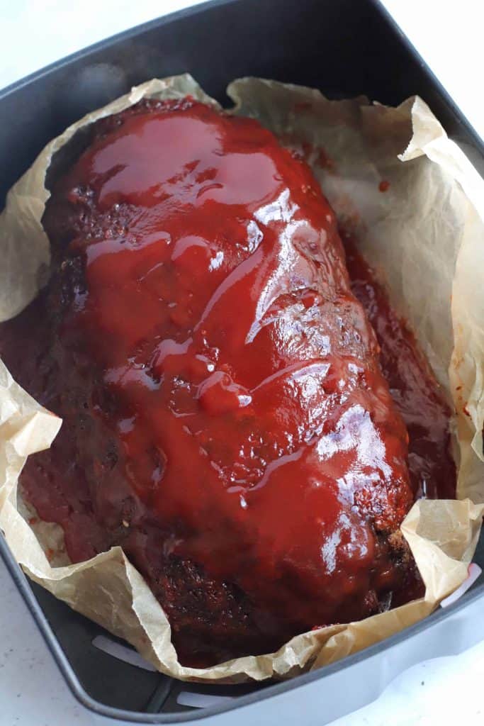 Meatloaf with glaze on top of it.