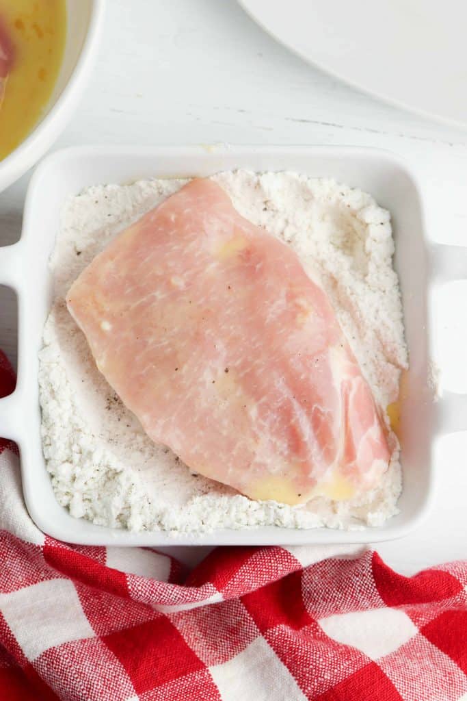 Pork chop dredged in flour.