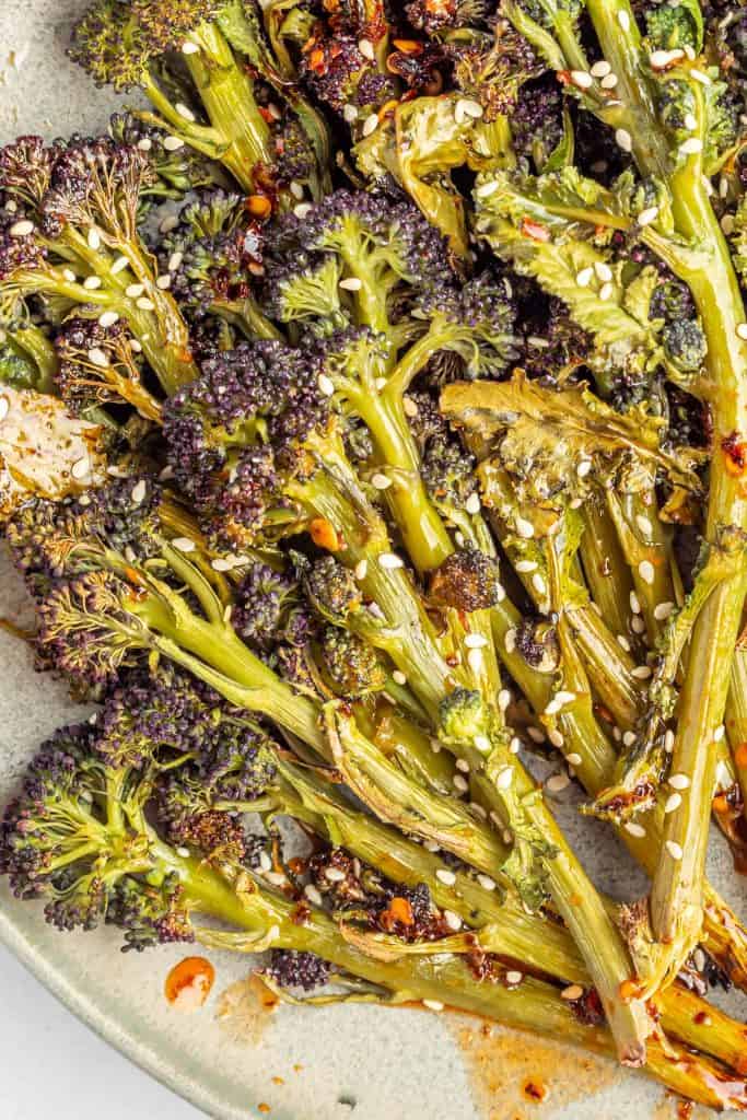 Closeup of broccolini with sesame seeds.