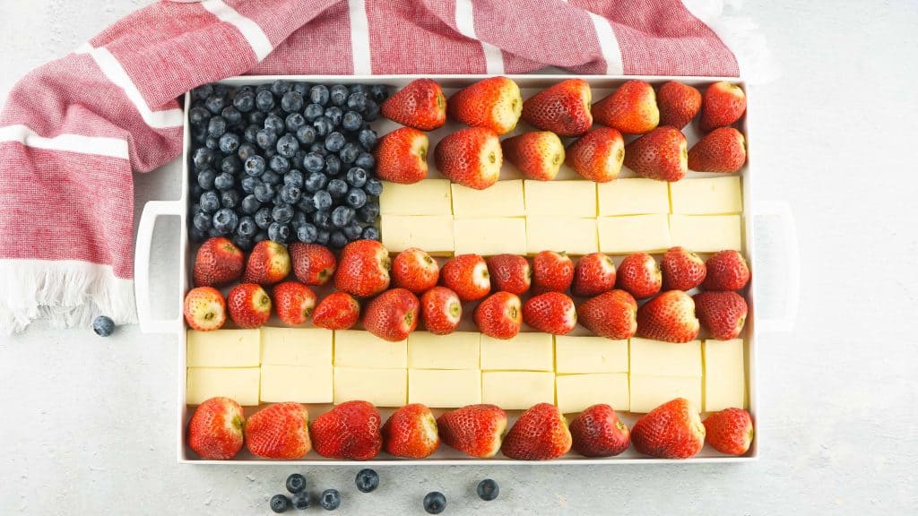 Red, white and blue fruit and cheese platter.