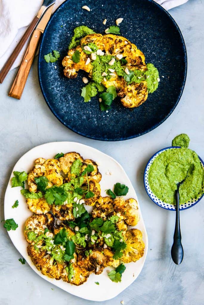 Overhead view of air fryer cauliflower steaks