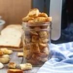 Homemade croutons in a Mason jar.