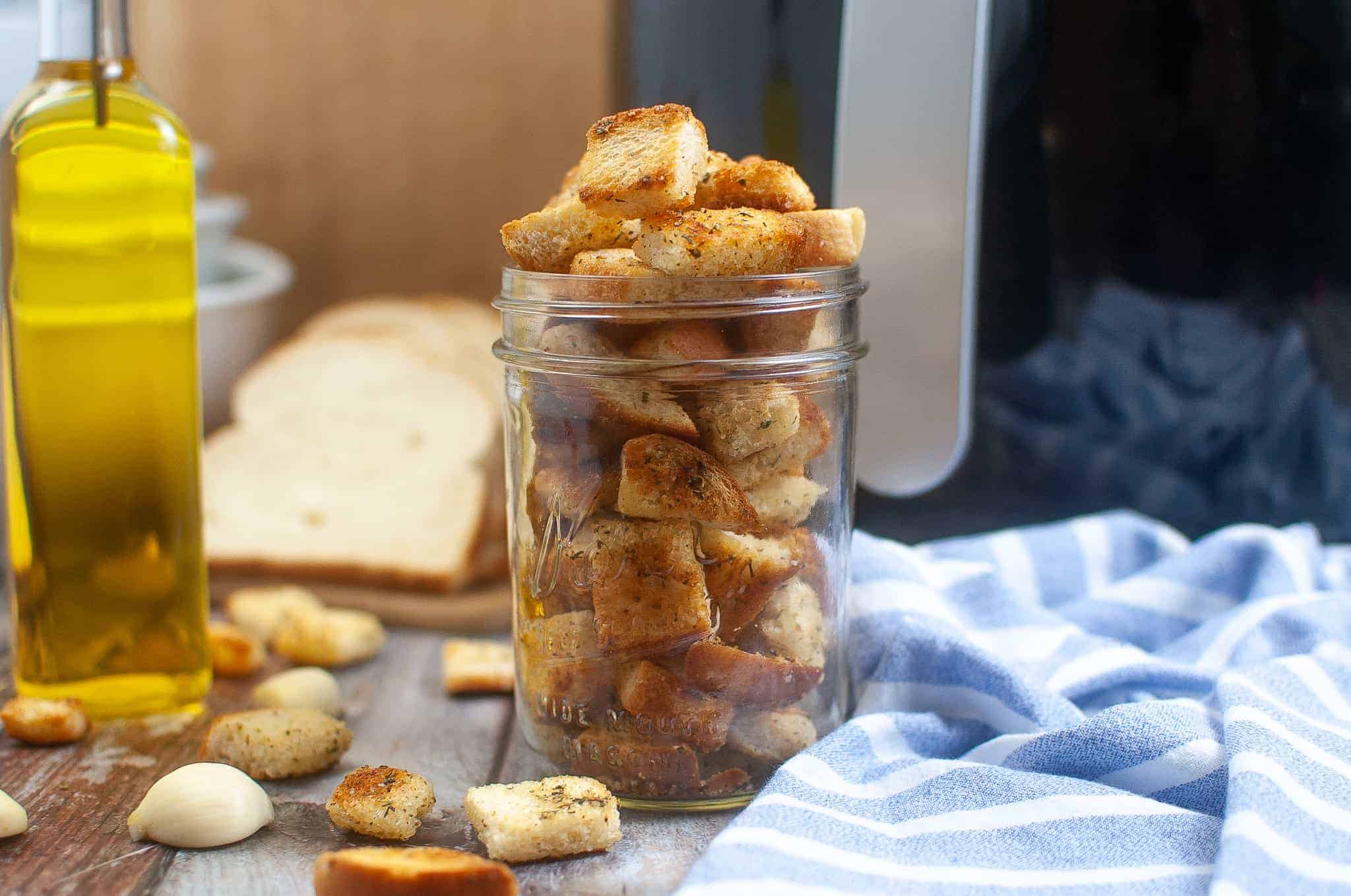 Homemade croutons in a Mason jar.