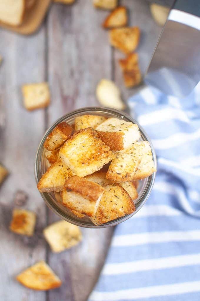 Overhead view of Air Fryer Croutons in a Mason jar.