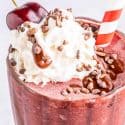 Closeup of chocolate covered cherry milkshake