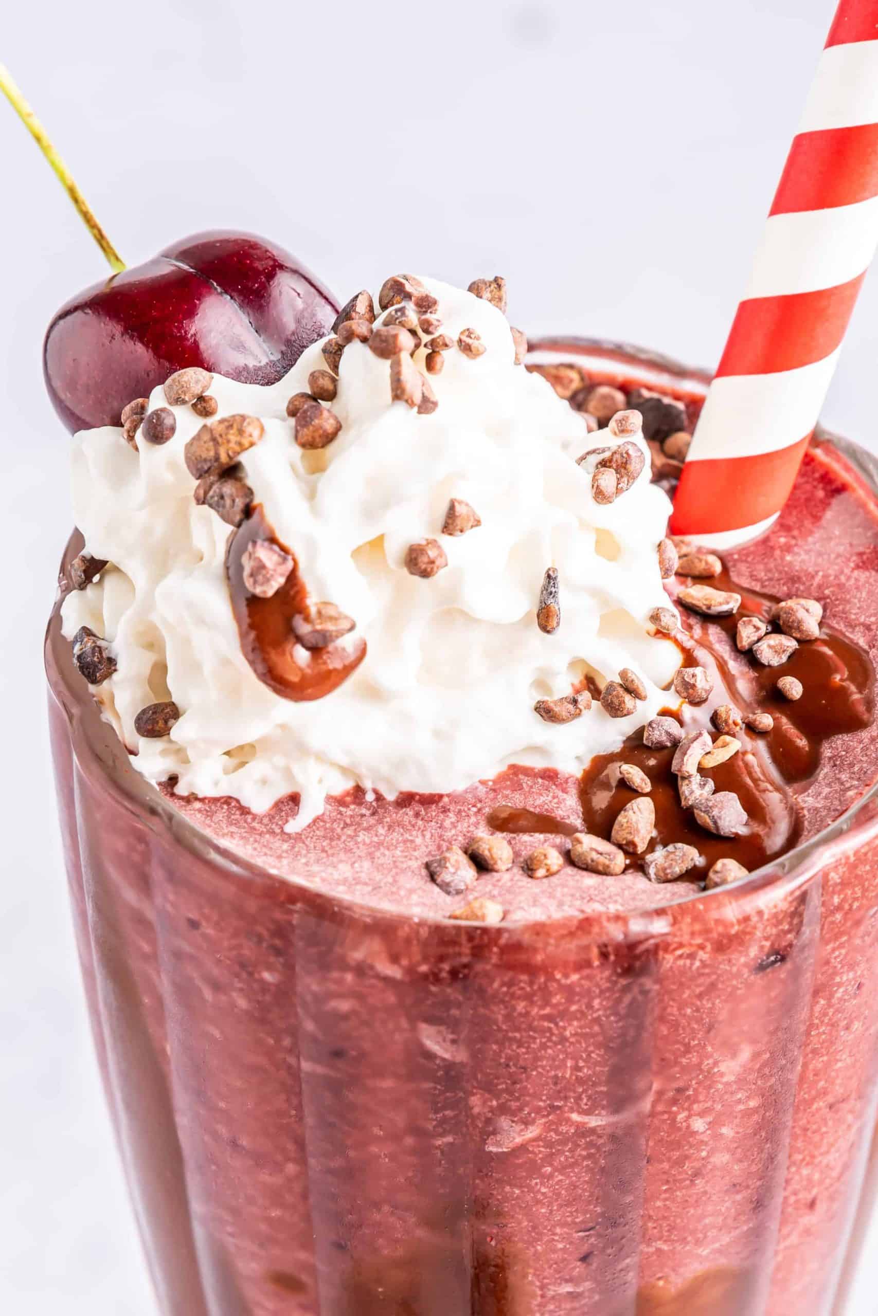Closeup of chocolate covered cherry milkshake