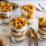 4 No Bake Apple Pie Parfaits with spoons.