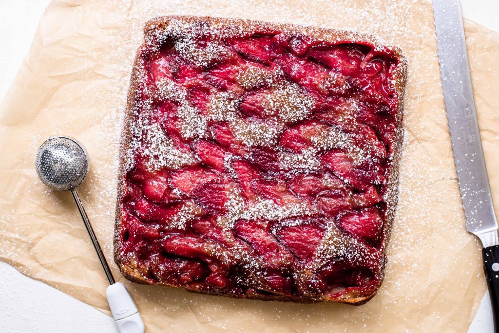 Strawberry Upside Down Bars turned out on parchment paper.