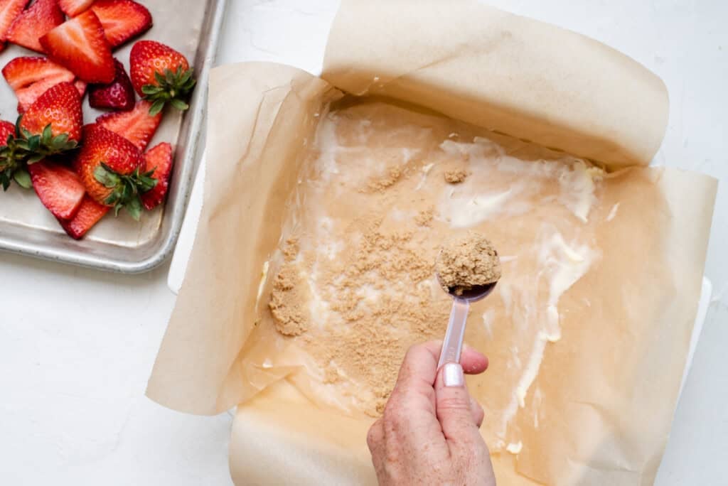 Brown sugar sprinkled in pan.