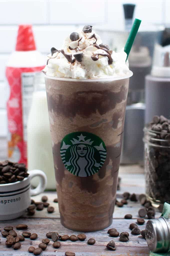Copycat Starbucks Java Chip Frappuccino in a tall glass with whipped cream