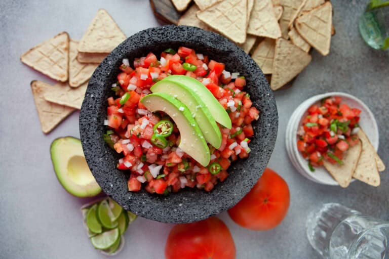 sliced avocado on top of pico de Gallo