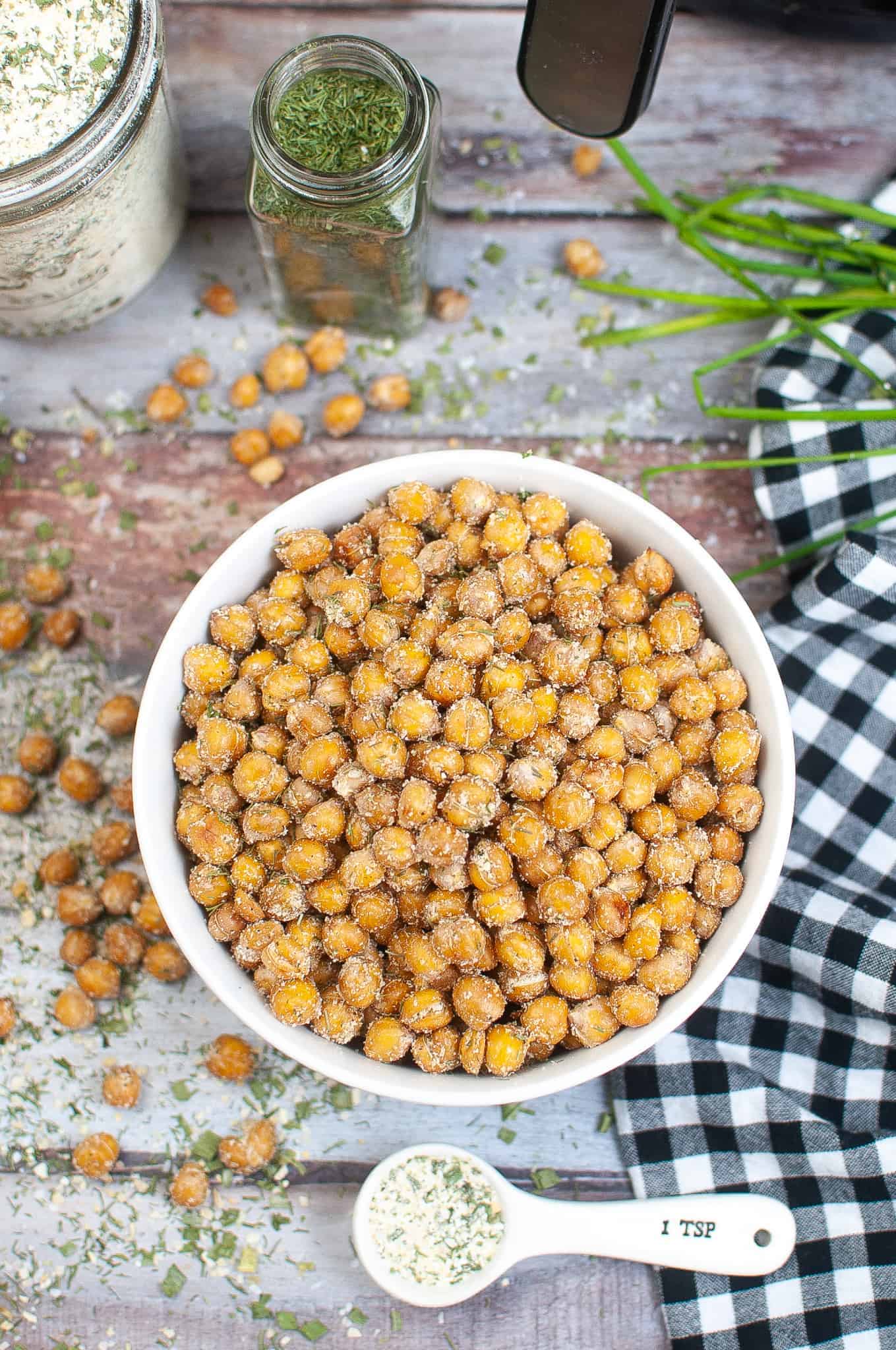 Overhead view of ranch chickpeas in a white bowl.