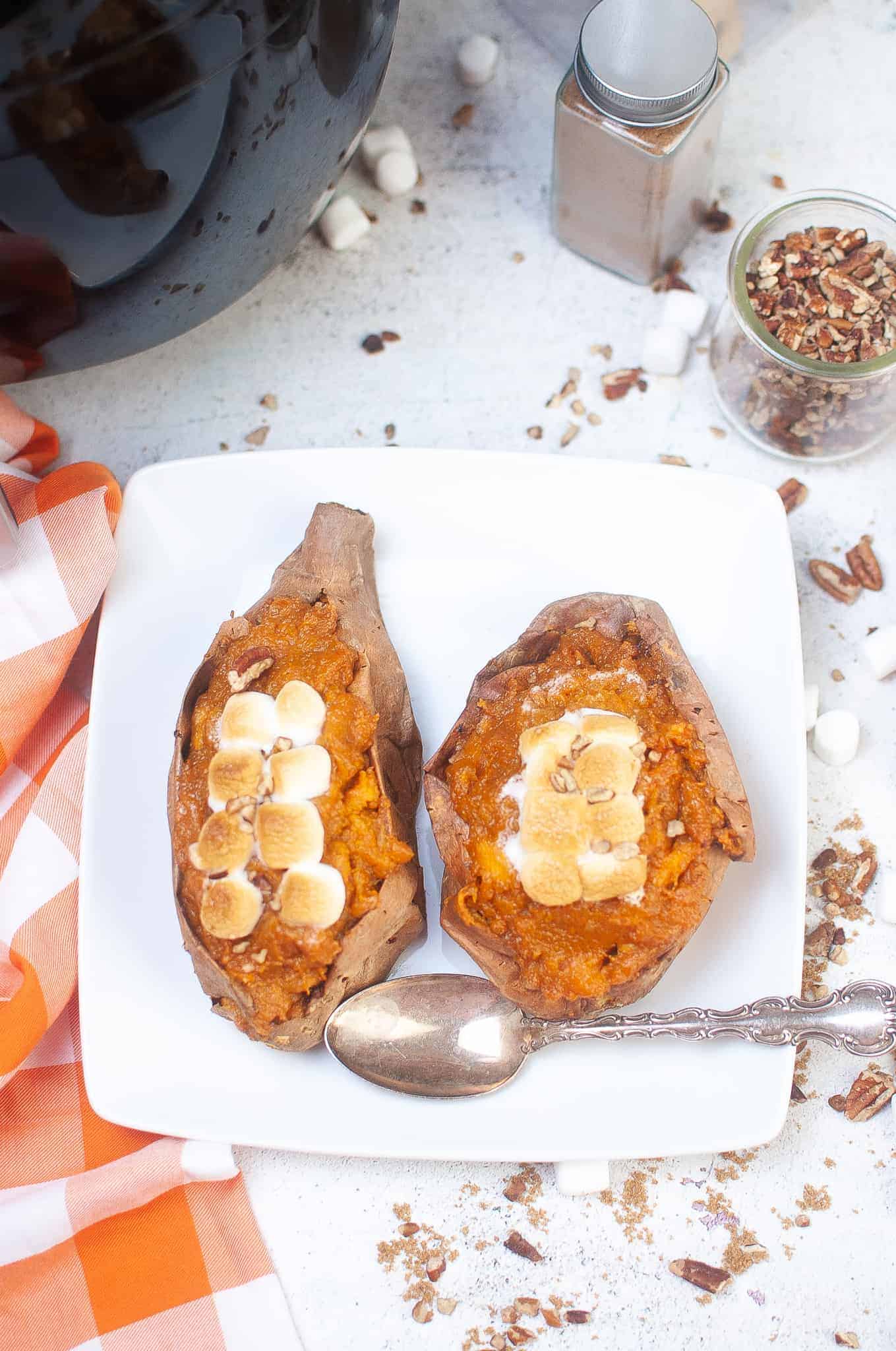 Overhead view of air fryer stuffed sweet potatoes with marshmallows.