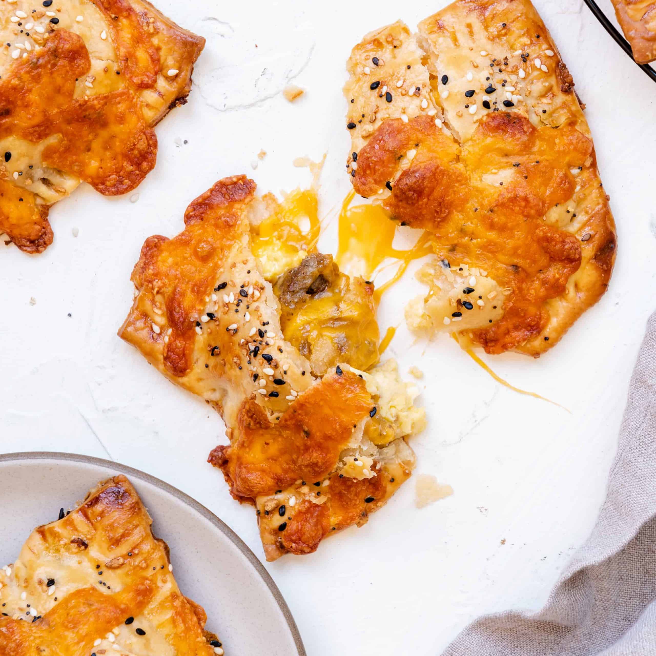 Savory hand pies broken in half.