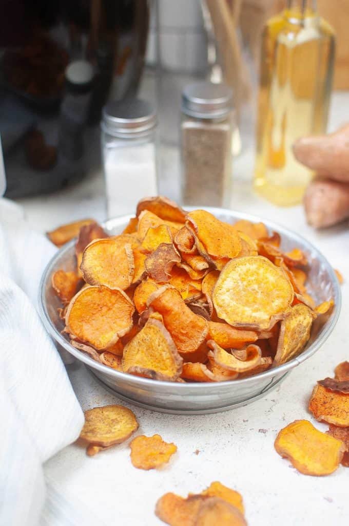 Sweet potato chips in tin bowl.