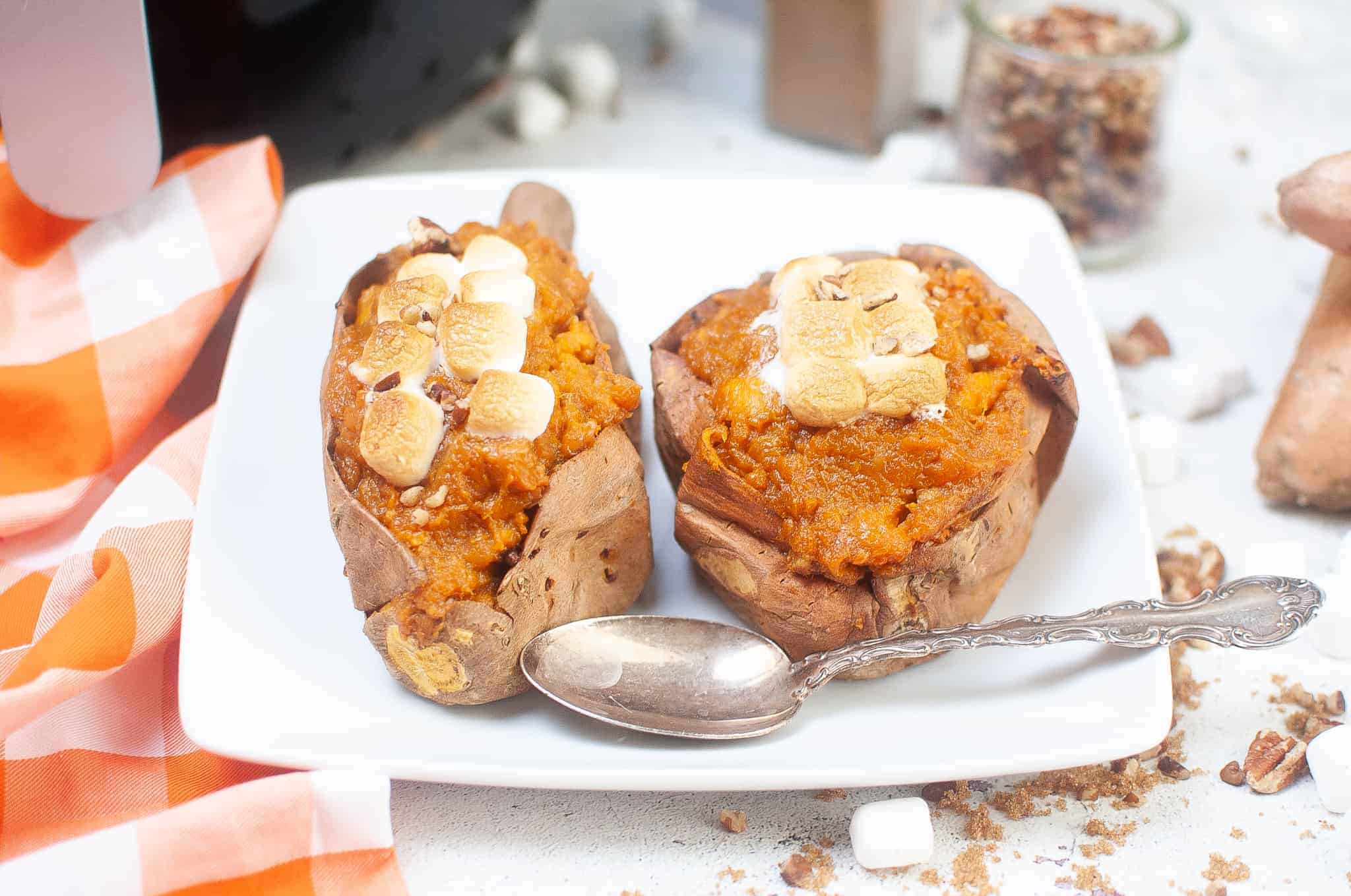 Air fryer stuffed sweet potatoes on a white plate.