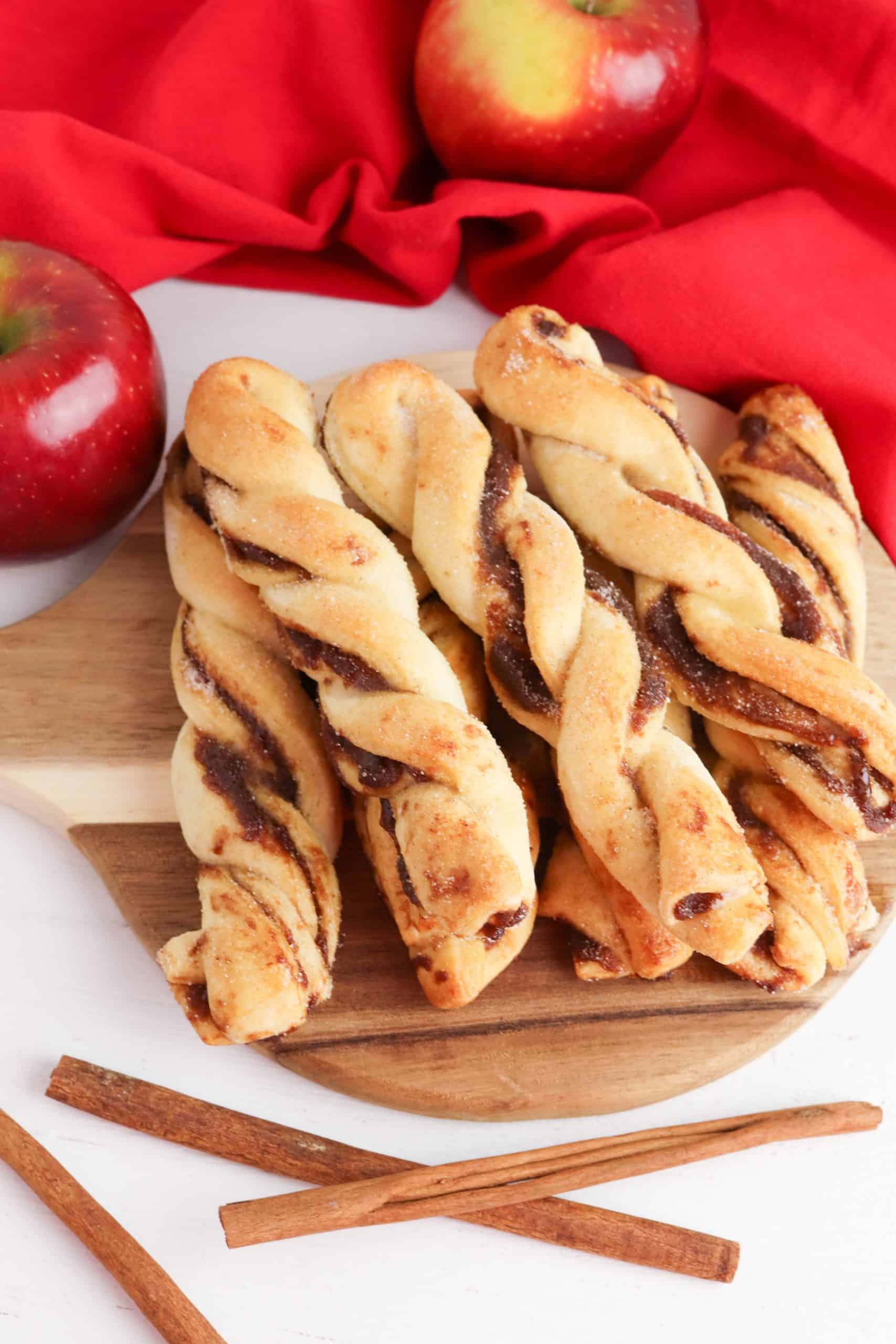 Apple Butter Dessert Twists on a cutting board.