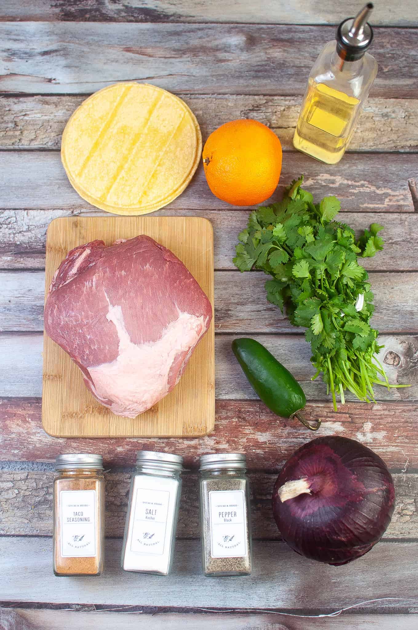 Overhead view of ingredients for carnitas in the air fryer.