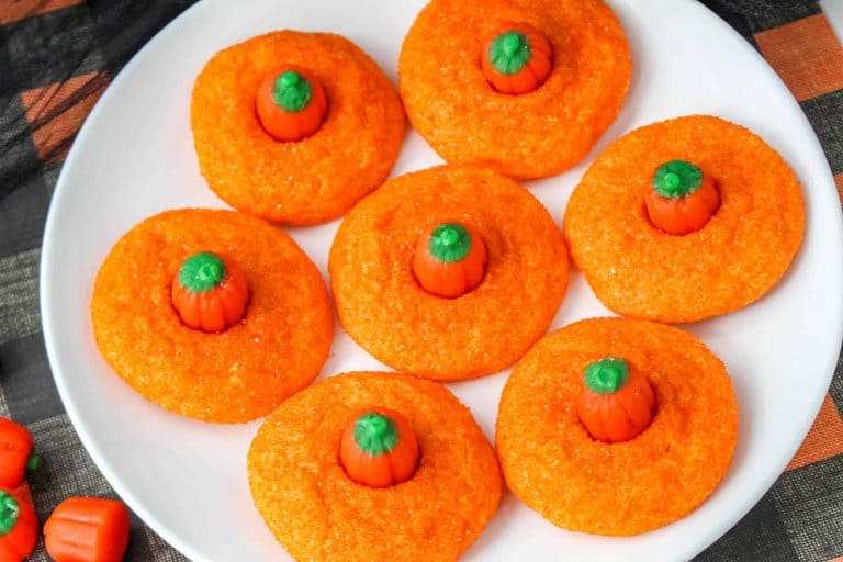 Fall Pumpkin Cookies on a white plate.
