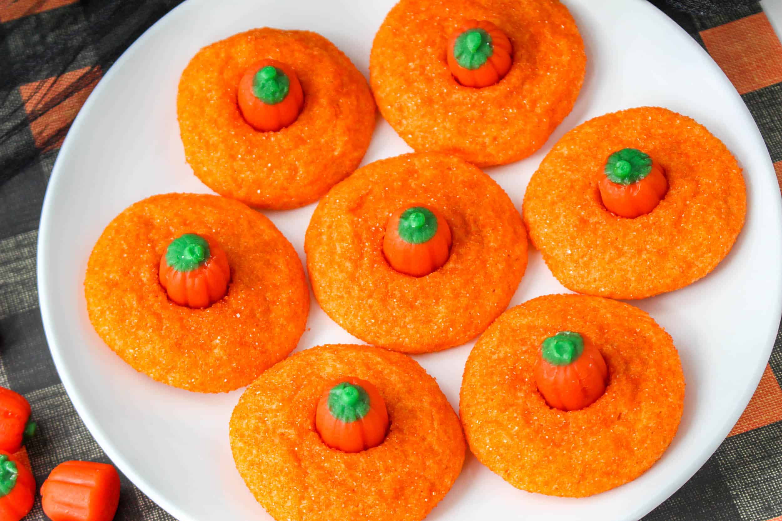 Fall Pumpkin Cookies on a white plate.