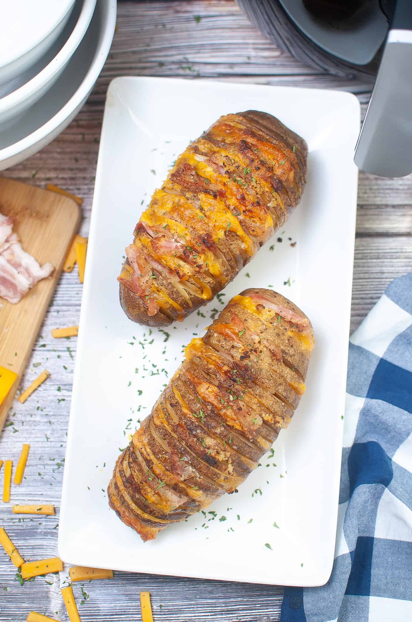 Overhead view of Hasselback Potatoes with Bacon and C