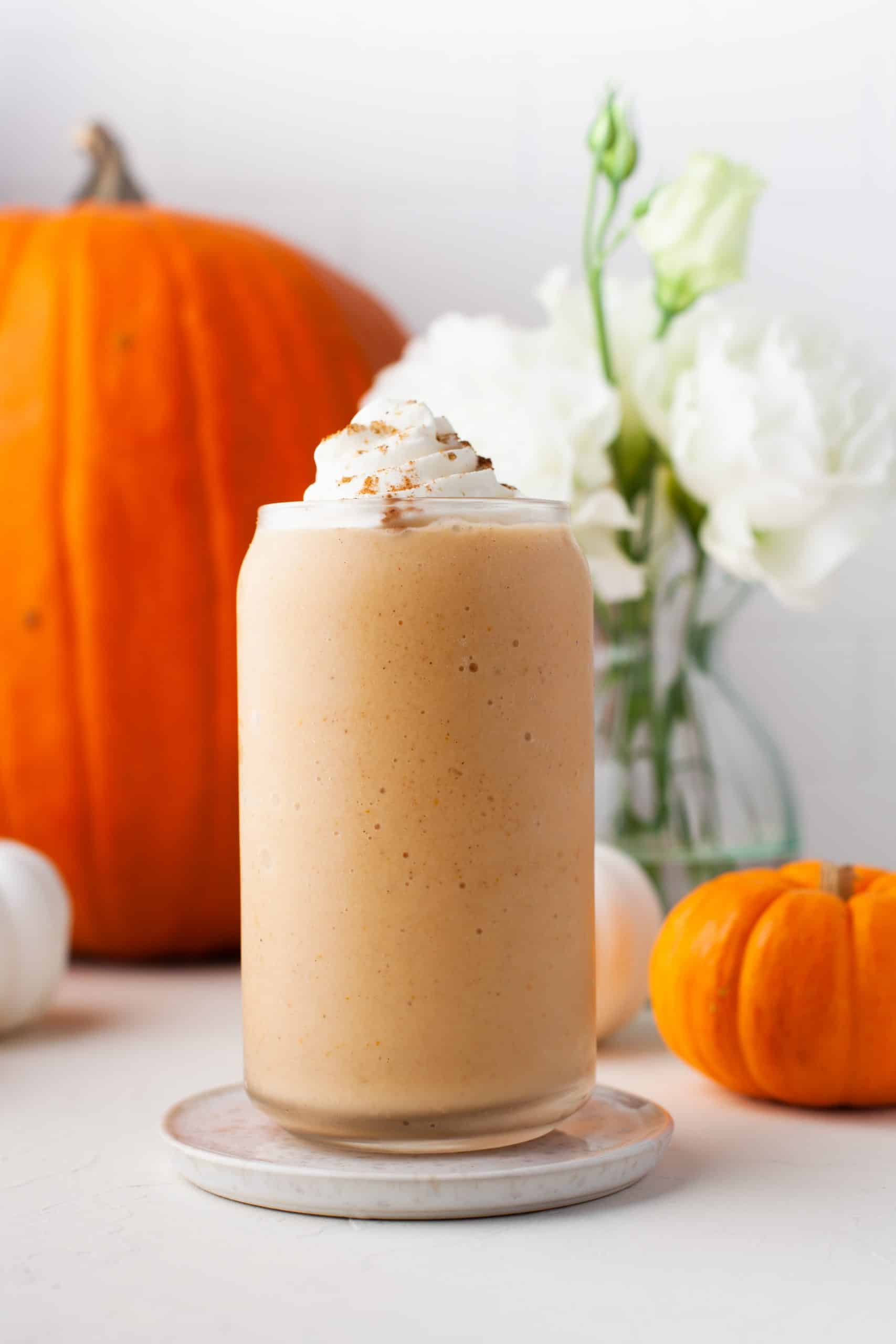 Pumpkin smoothie with whipped cream.