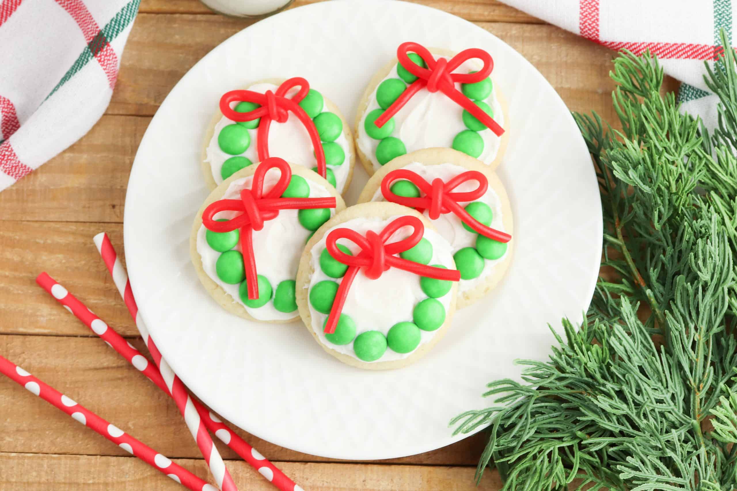 Overhead photo of Christmas Wreath Cookies on a white plate.