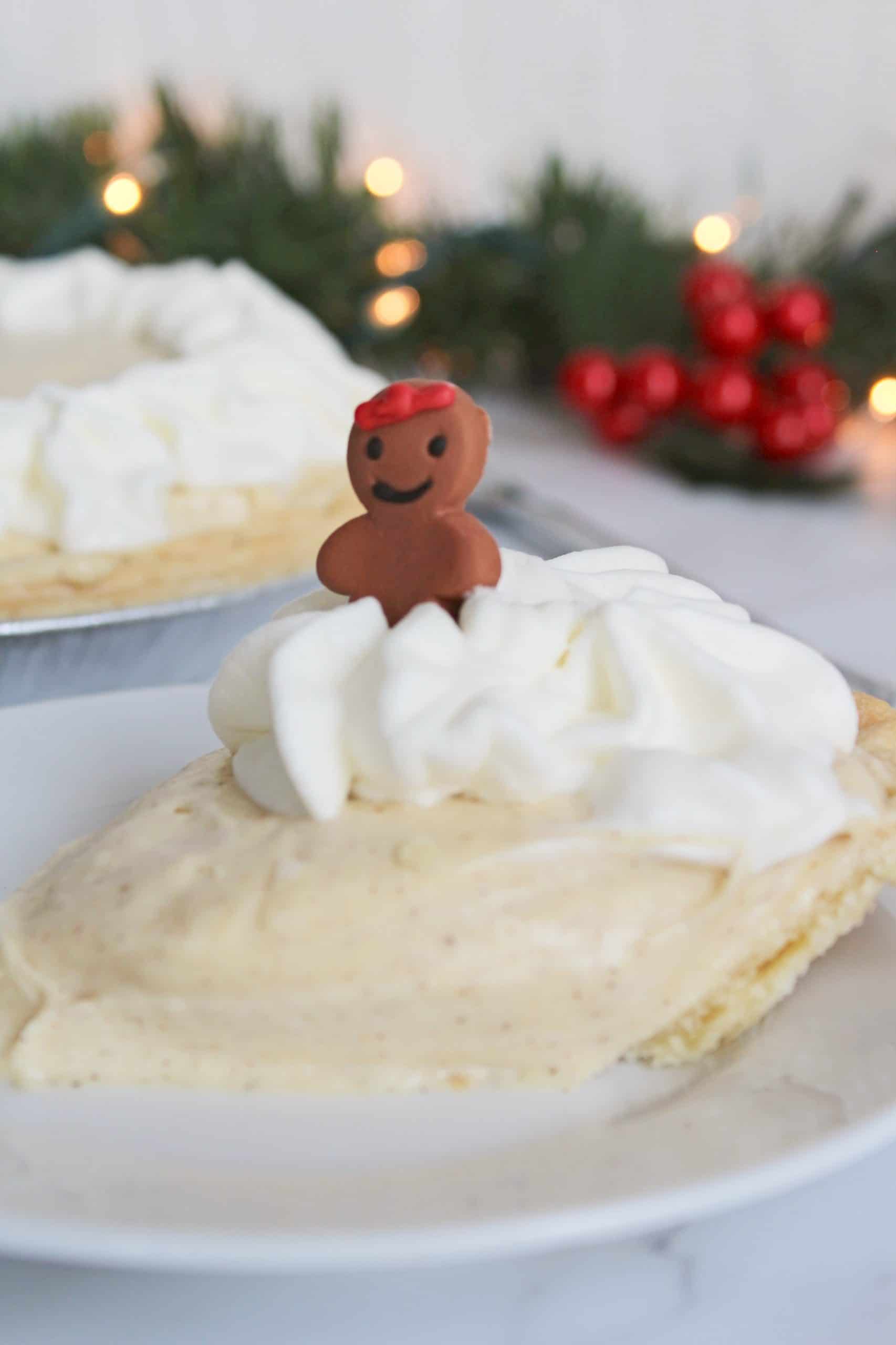 Slice of gingerbread cream pie on a white plate.