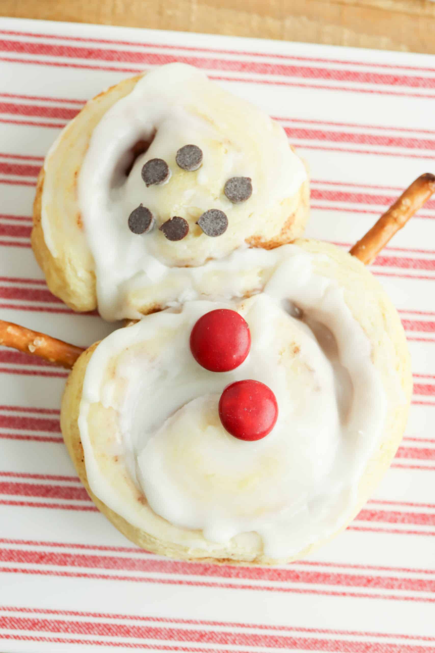 Overhead view of Snowman Cinnamon Roll.