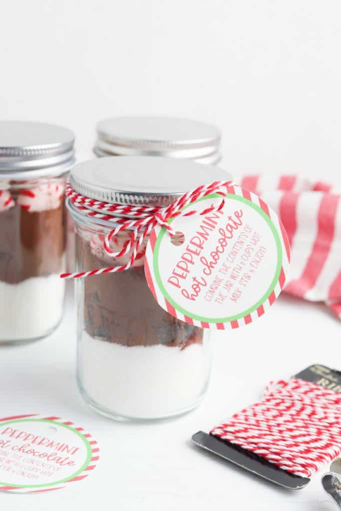 Tag on Mason jar with peppermint hot chocolate ingredients in it.