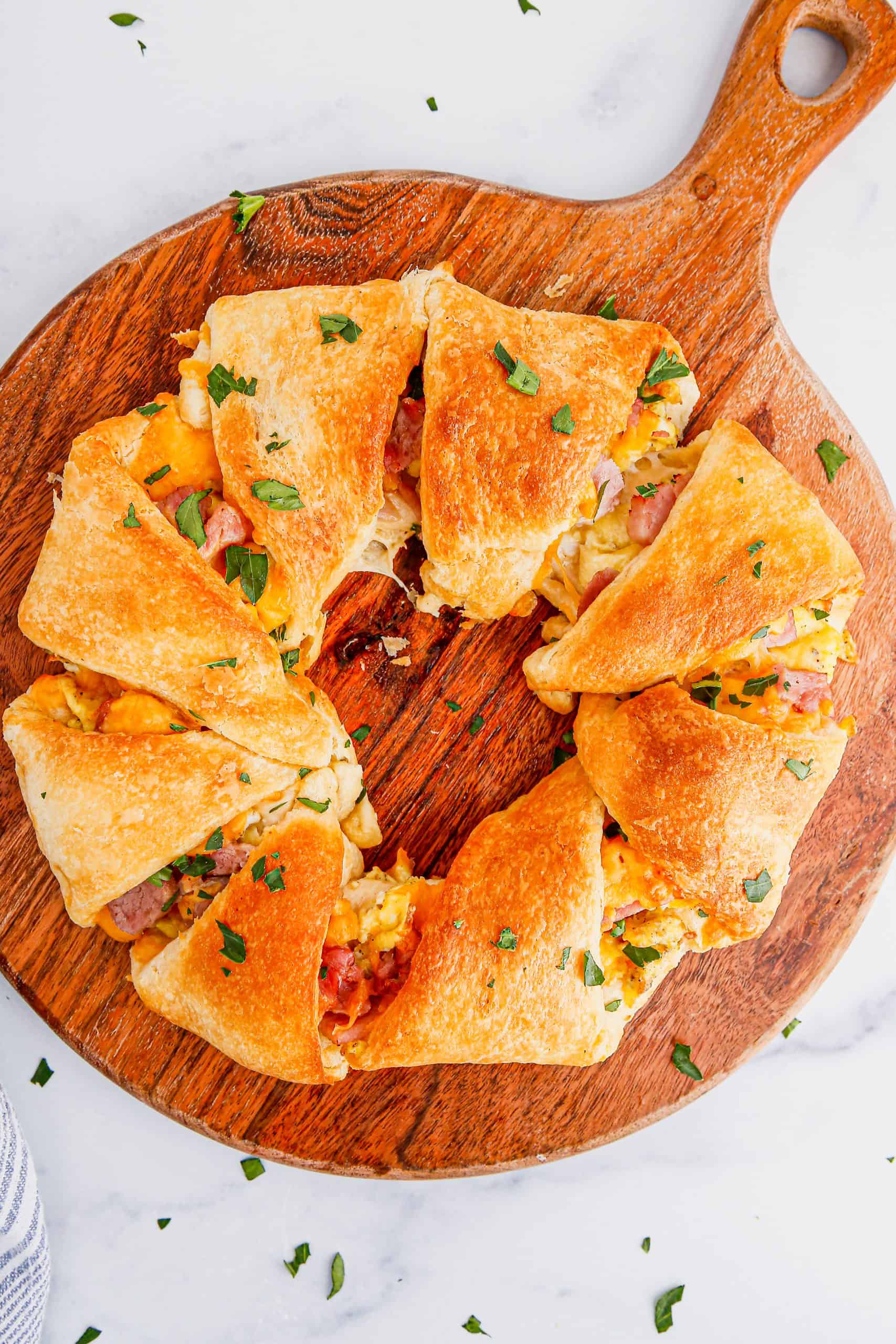 Overhead view of ham, egg and cheese crescent roll breakfast ring.
