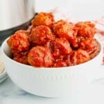Cranberry Meatballs in a white bowl.