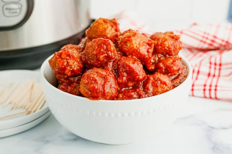 Cranberry Meatballs in a white bowl.