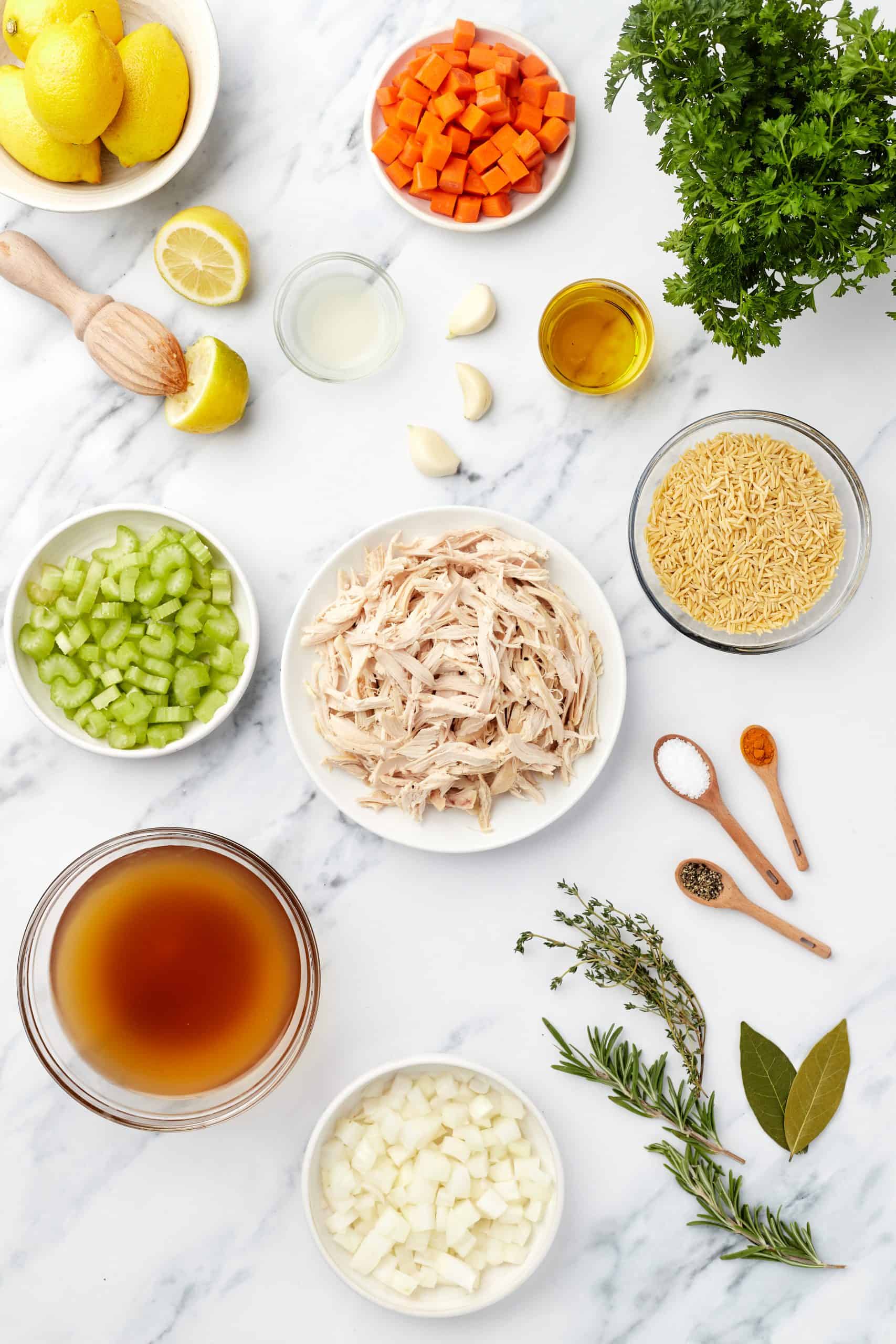 Ingredients for soup with lemon and orzo.