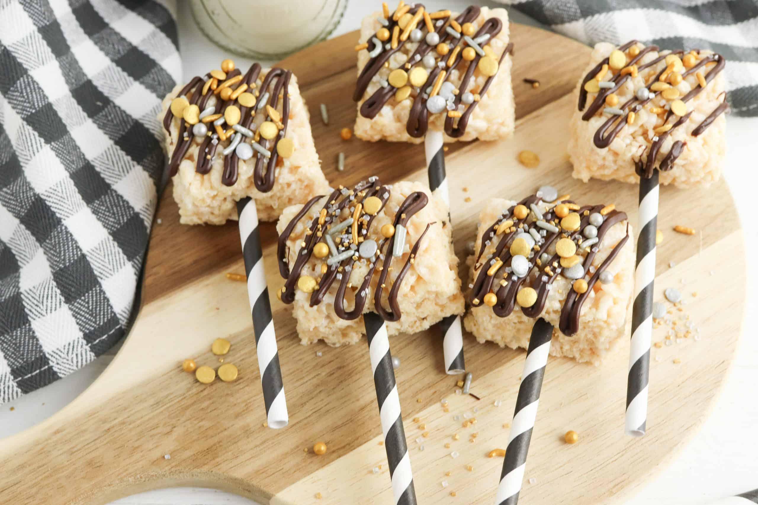 New Year's snacks on striped straws.