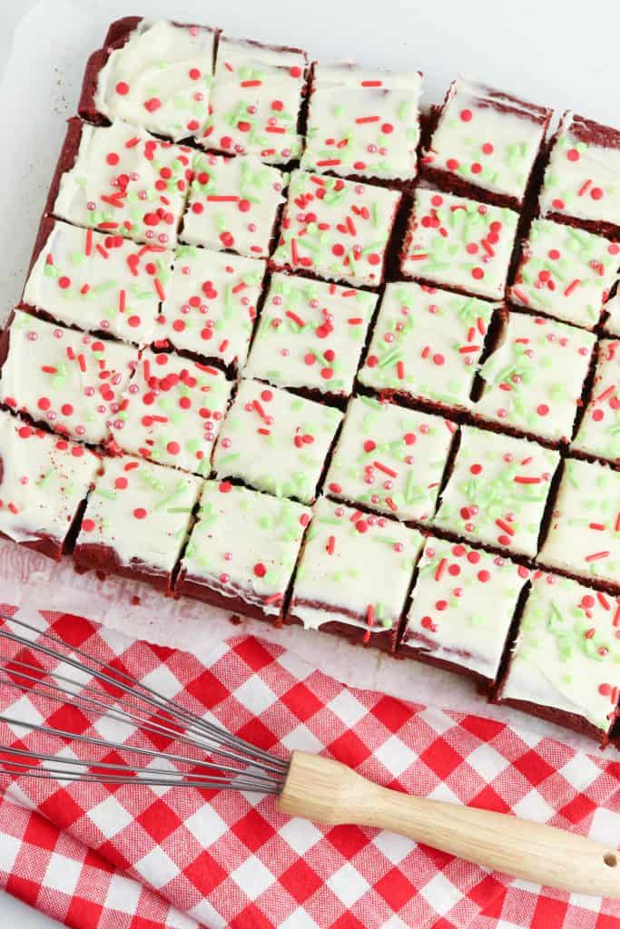 Overhead Red Velvet Christmas Cookie Bars cut into squares.