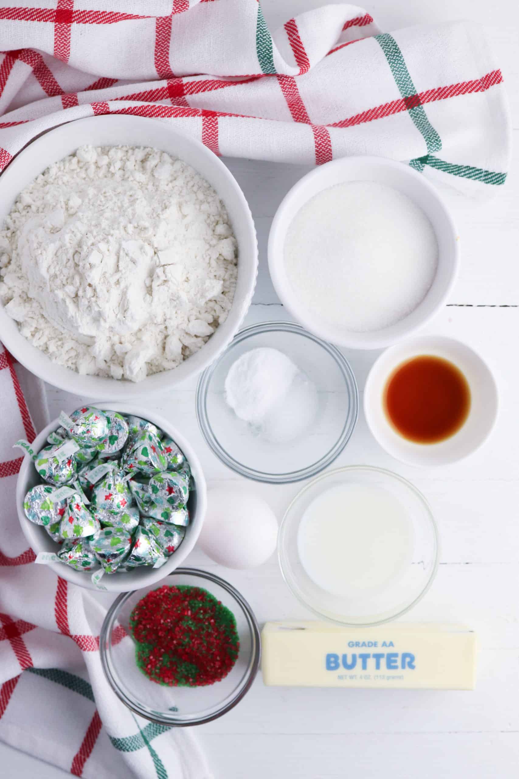 Ingredients for sugar cookies with Hershey's Kisses.