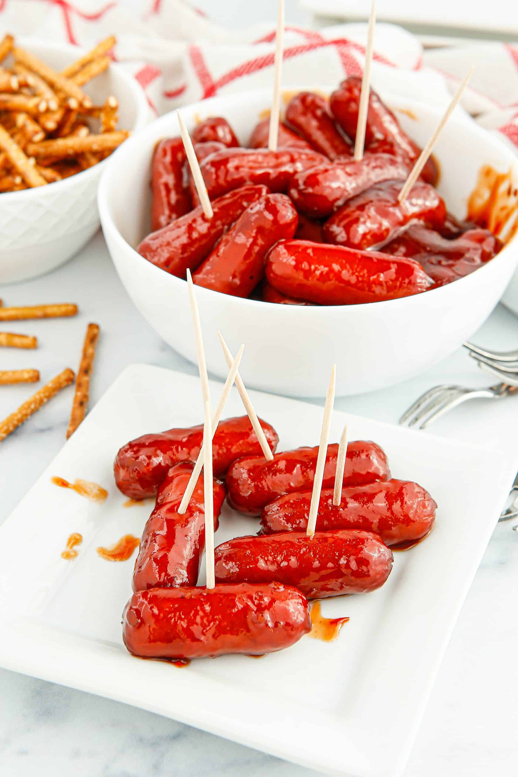Serving air fryer little smokies as an appetizer on a white plate.