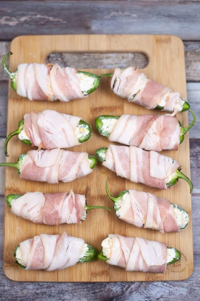 jalape&ntilde;os wrapped in bacon.