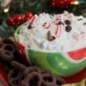 Horizontal view of peppermint bark cheesecake dip.