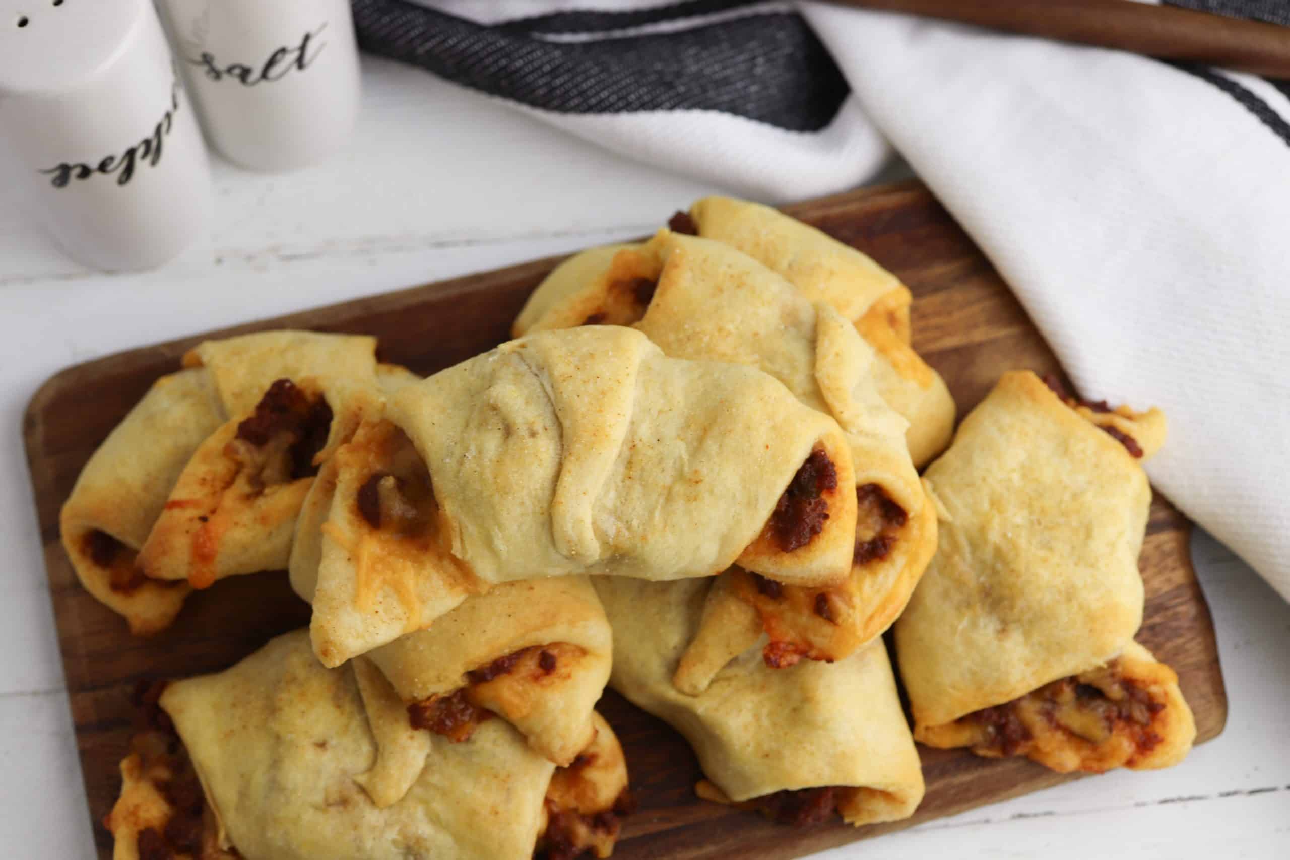 Crescent Roll Sloppy Joe Sliders on a cutting board.